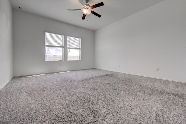 102 George Kimble Cv, Bastrop, TX 78602 - unfurnished room with carpet flooring, ceiling fan, and baseboards