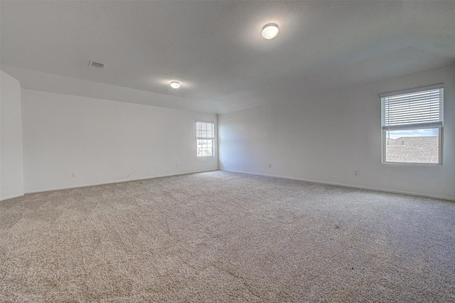 102 George Kimble Cv, Bastrop, TX 78602 - carpeted spare room featuring baseboards