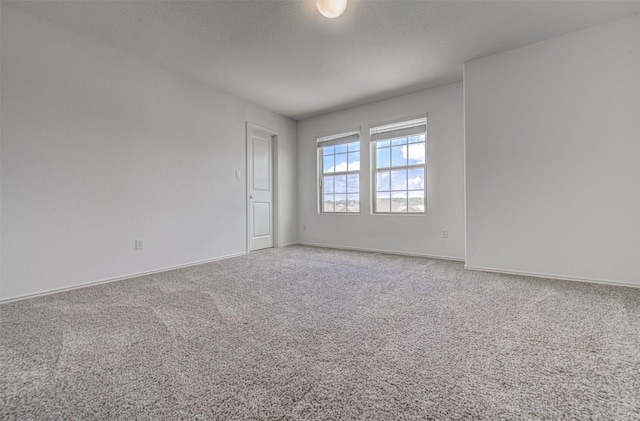 102 George Kimble Cv, Bastrop, TX 78602 - carpeted spare room featuring baseboards