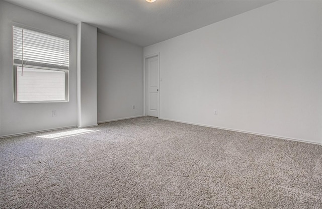 102 George Kimble Cv, Bastrop, TX 78602 - carpeted spare room featuring baseboards