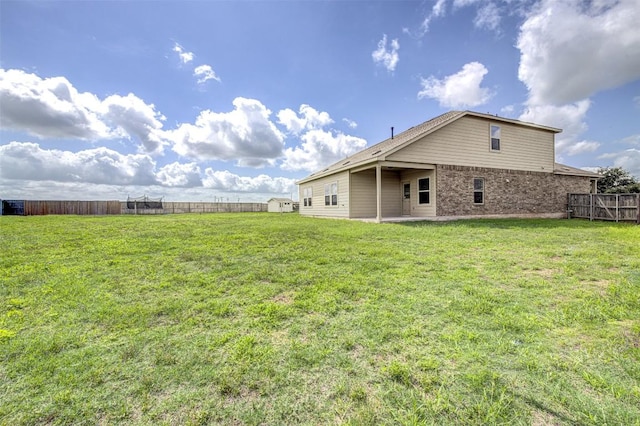 102 George Kimble Cv, Bastrop, TX 78602 - view of yard featuring a patio