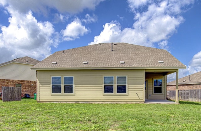 102 George Kimble Cv, Bastrop, TX 78602 - back of house with a patio area and roof with shingles