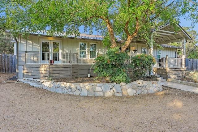 5604 Hudson Bend Rd, Austin, TX 78734 - view of front of house featuring board and batten siding and a porch