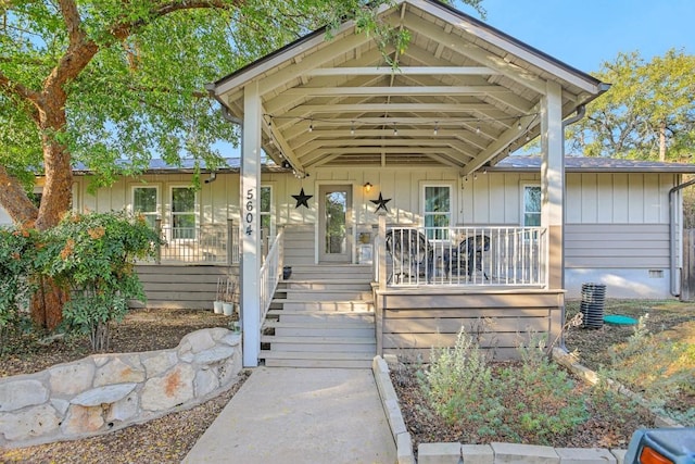 5604 Hudson Bend Rd, Austin, TX 78734 - view of front of property with covered porch and board and batten siding