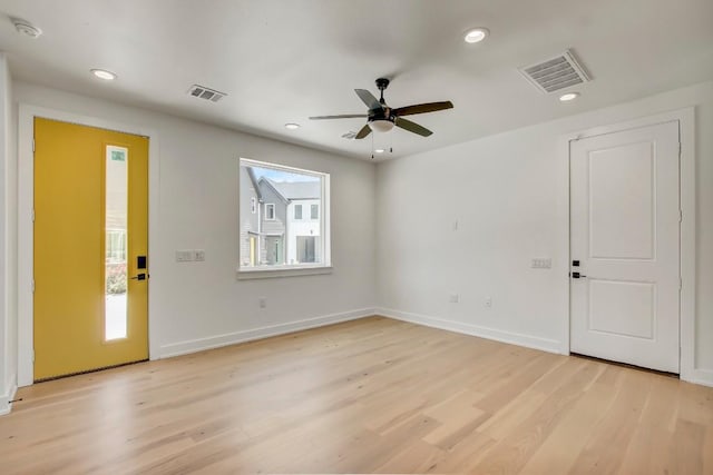 4127 E 12th St Unit 8, Austin, TX 78721 - foyer with light wood-style floors, a ceiling fan, recessed lighting, and baseboards