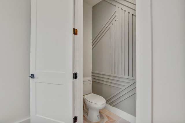 4127 E 12th St Unit 8, Austin, TX 78721 - bathroom with toilet and tile patterned floors