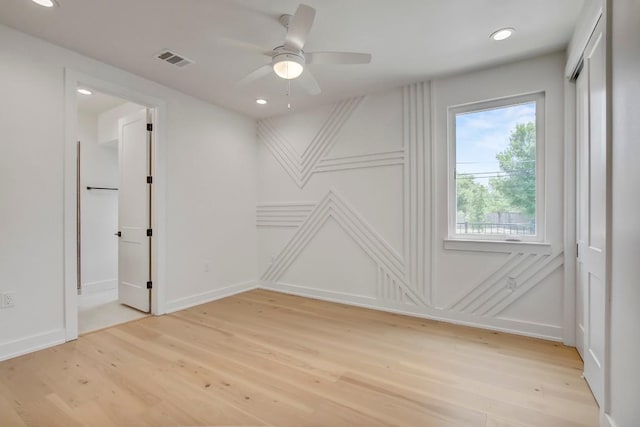 4127 E 12th St Unit 8, Austin, TX 78721 - empty room with light wood-style flooring, recessed lighting, a ceiling fan, and baseboards