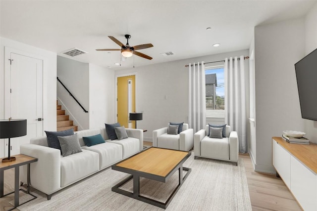 4127 E 12th St Unit 8, Austin, TX 78721 - living area with ceiling fan, stairs, light wood-style floors, recessed lighting, and baseboards