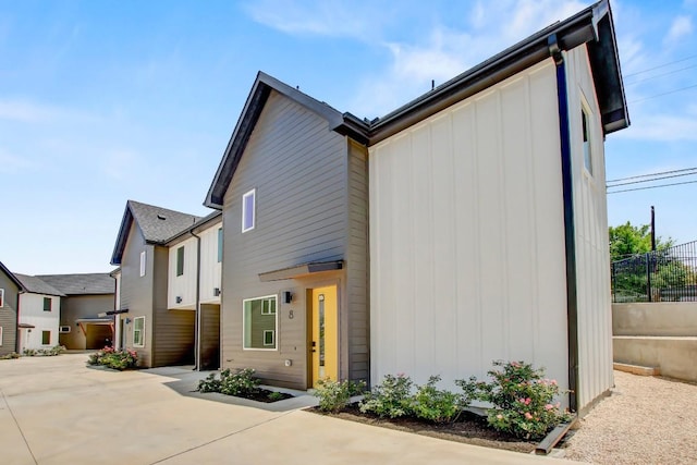 4127 E 12th St Unit 8, Austin, TX 78721 - contemporary house with a patio and board and batten siding