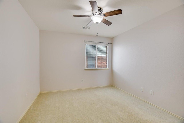 11120 Los Comancheros Rd, Austin, TX 78717 - spare room with ceiling fan, light colored carpet, and baseboards