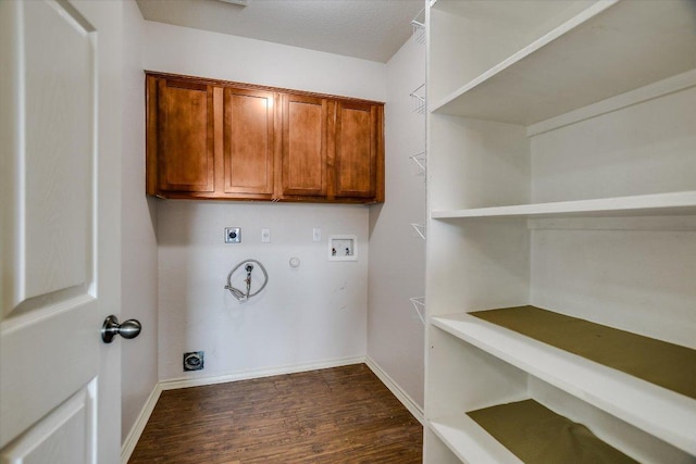 11120 Los Comancheros Rd, Austin, TX 78717 - laundry area with hookup for an electric dryer, hookup for a washing machine, dark wood-style flooring, hookup for a gas dryer, and baseboards
