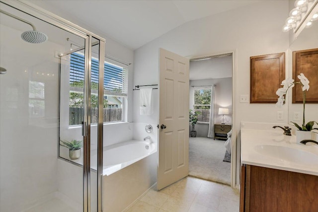 11120 Los Comancheros Rd, Austin, TX 78717 - full bathroom with a shower stall, a bath, lofted ceiling, ensuite bath, and double vanity
