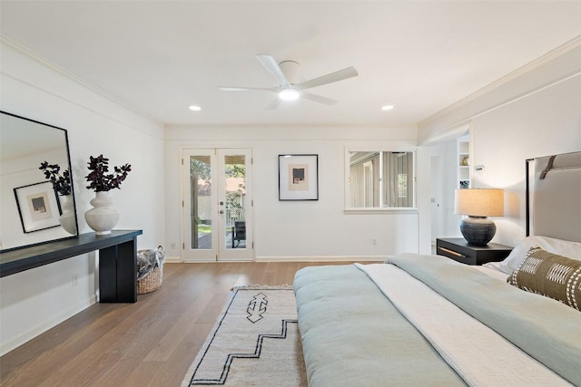 4607 Balcones Dr, Austin, TX 78731 - bedroom with french doors, wood finished floors, access to exterior, a ceiling fan, and crown molding