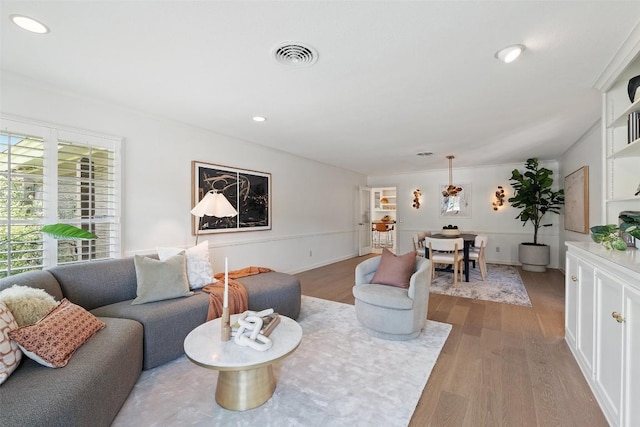 4607 Balcones Dr, Austin, TX 78731 - living area featuring wood finished floors and recessed lighting