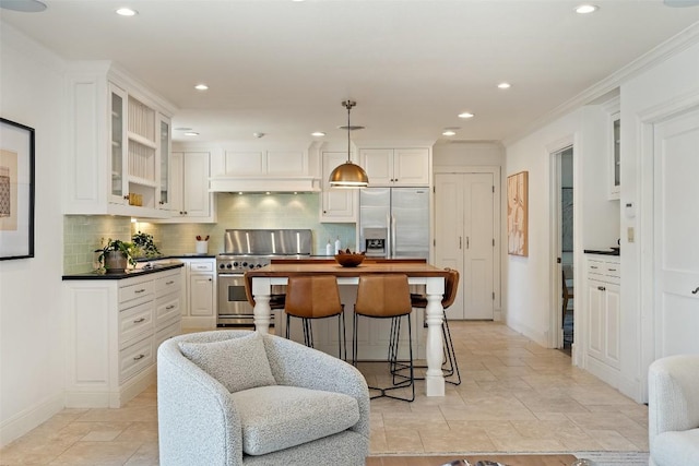 4607 Balcones Dr, Austin, TX 78731 - kitchen with stove, stainless steel refrigerator with ice dispenser, recessed lighting, white cabinets, and tasteful backsplash