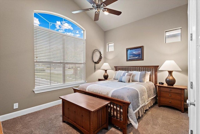 21912 Rock Wren Rd, Spicewood, TX 78669 - bedroom featuring light colored carpet, vaulted ceiling, baseboards, and a ceiling fan