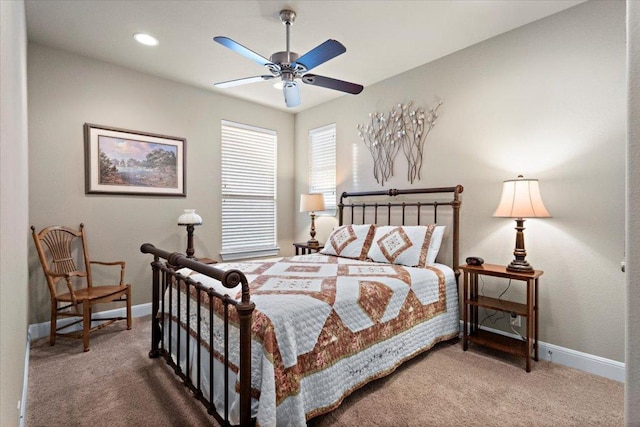 21912 Rock Wren Rd, Spicewood, TX 78669 - carpeted bedroom with baseboards and ceiling fan