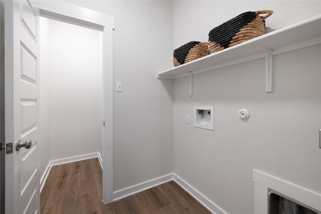 129 Syrah Ct, Leander, TX 78641 - washroom featuring washer hookup, dark wood-type flooring, baseboards, and gas dryer hookup