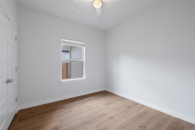 129 Syrah Ct, Leander, TX 78641 - spare room featuring wood finished floors, ceiling fan, and baseboards