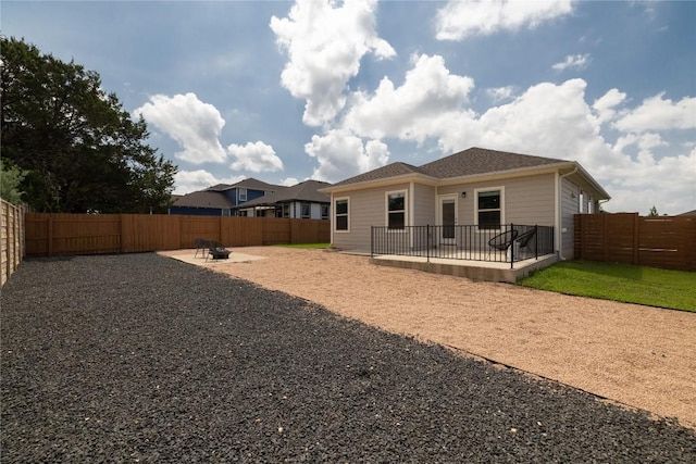 129 Syrah Ct, Leander, TX 78641 - rear view of property with a patio area and a fenced backyard