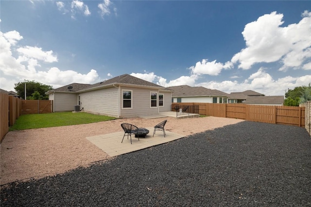129 Syrah Ct, Leander, TX 78641 - rear view of house featuring cooling unit, a fenced backyard, and a patio
