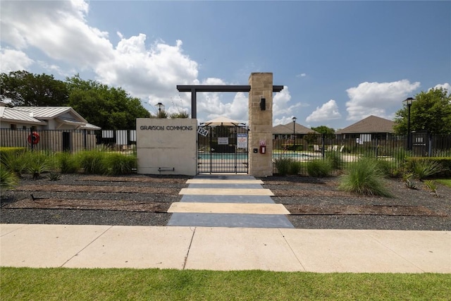 129 Syrah Ct, Leander, TX 78641 - view of community featuring a gate