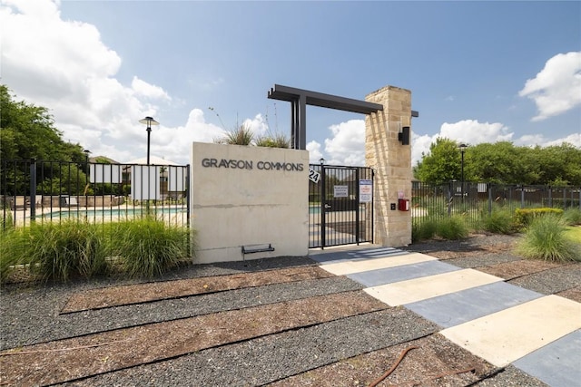 129 Syrah Ct, Leander, TX 78641 - view of property's community with a gate and a swimming pool