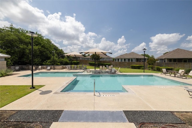 129 Syrah Ct, Leander, TX 78641 - community pool featuring a patio