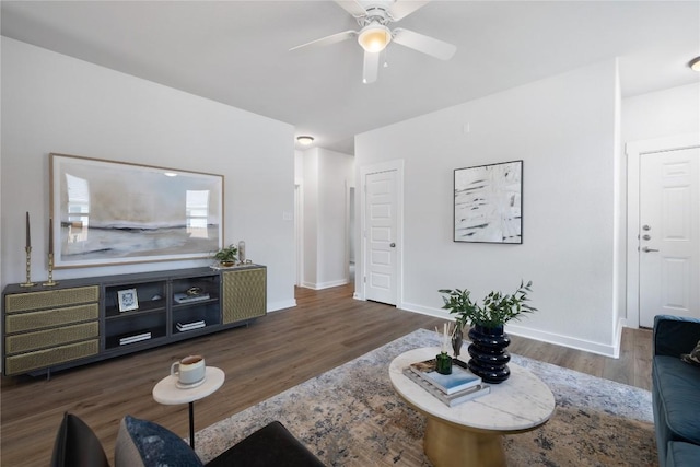 129 Syrah Ct, Leander, TX 78641 - living room featuring a ceiling fan, wood finished floors, and baseboards