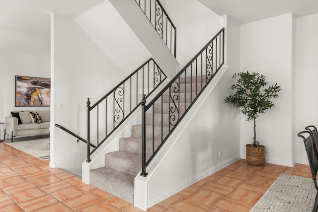 5913 N W Pl, Austin, TX 78731 - staircase featuring baseboards