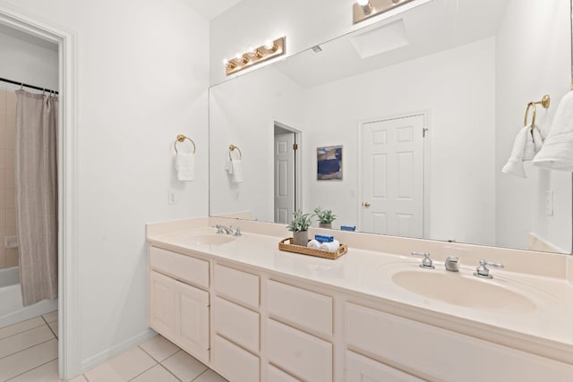 5913 N W Pl, Austin, TX 78731 - full bathroom with double vanity, tile patterned flooring, shower / bath combination with curtain, and baseboards