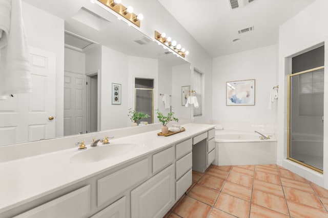 5913 N W Pl, Austin, TX 78731 - bathroom with vanity, a shower stall, a bath, and tile patterned flooring