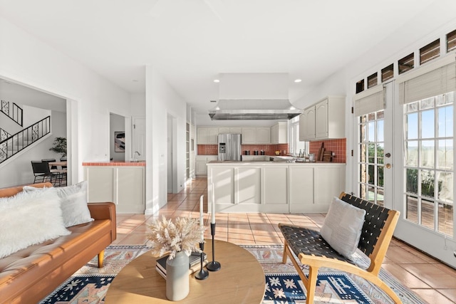 5913 N W Pl, Austin, TX 78731 - living room featuring light tile patterned floors, stairway, recessed lighting, and baseboards