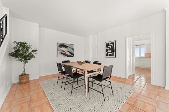 5913 N W Pl, Austin, TX 78731 - dining space with light tile patterned floors and baseboards
