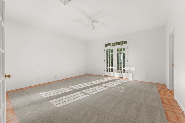 5913 N W Pl, Austin, TX 78731 - unfurnished room featuring ceiling fan, baseboards, and french doors