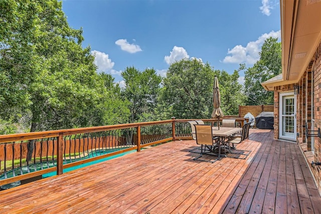10672 Bramblecrest Dr, Austin, TX 78726 - wooden deck featuring outdoor dining space and grilling area