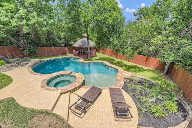 10672 Bramblecrest Dr, Austin, TX 78726 - view of pool with a gazebo, a fenced backyard, a pool with connected hot tub, and a patio