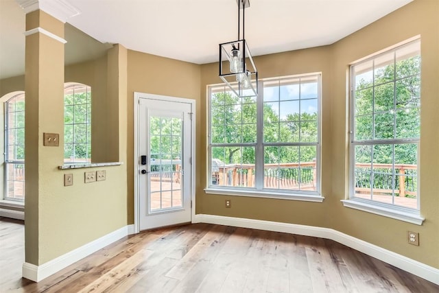 10672 Bramblecrest Dr, Austin, TX 78726 - unfurnished dining area featuring wood finished floors and baseboards