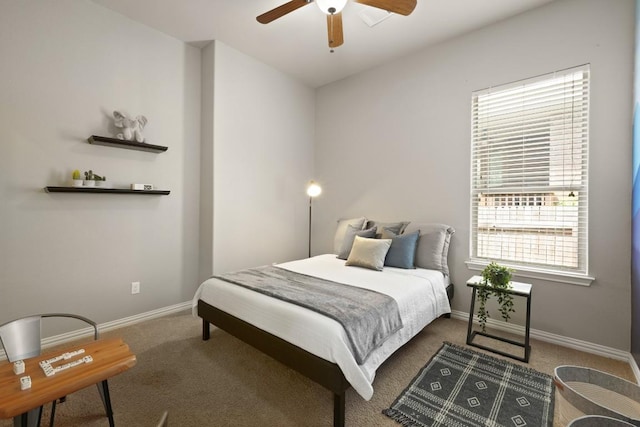 495 Catalina Ln, Austin, TX 78737 - carpeted bedroom with baseboards, multiple windows, and ceiling fan