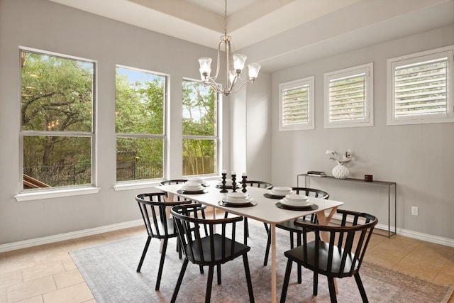 495 Catalina Ln, Austin, TX 78737 - dining area with healthy amount of natural light, light tile patterned floors, a chandelier, and baseboards