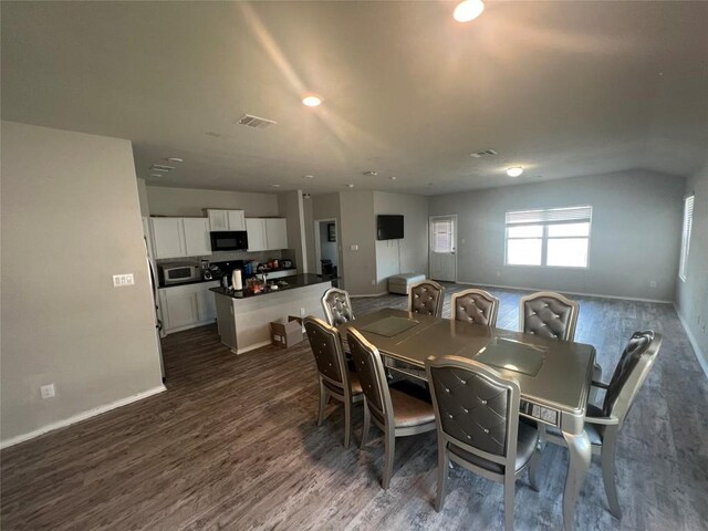 2425 Arctic Warbler, New Braunfels, TX 78130 - dining space featuring dark wood finished floors and recessed lighting