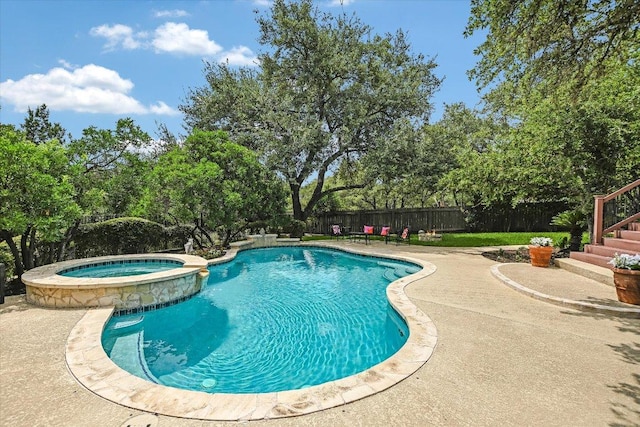 5801 Taylor Draper Cv, Austin, TX 78759 - view of swimming pool featuring a patio area, a fenced backyard, a pool with connected hot tub, and view of scattered trees