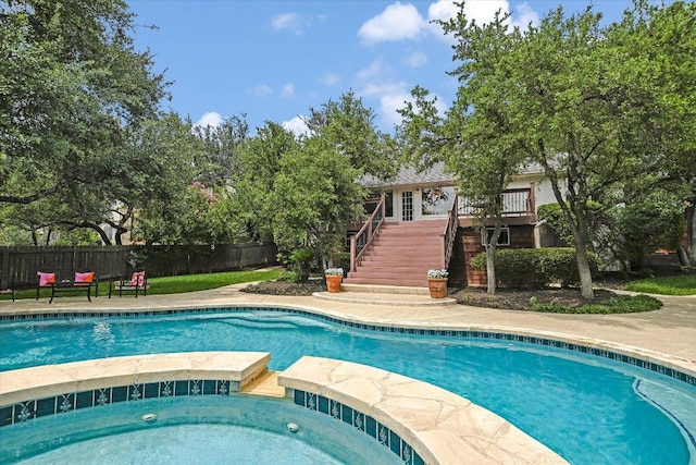 5801 Taylor Draper Cv, Austin, TX 78759 - view of pool featuring stairway and a pool with connected hot tub
