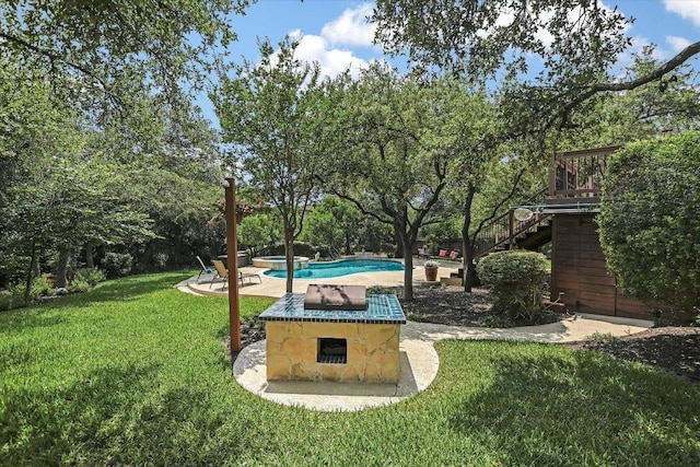 5801 Taylor Draper Cv, Austin, TX 78759 - view of grassy yard with stairway, an outdoor pool, a patio area, and view of scattered trees