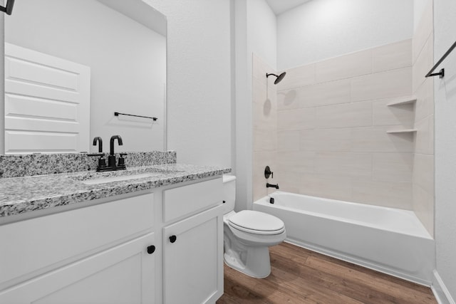 9709 Gladsome Path, Manor, TX 78653 - full bath featuring toilet, vanity, wood finished floors, and shower / bath combination