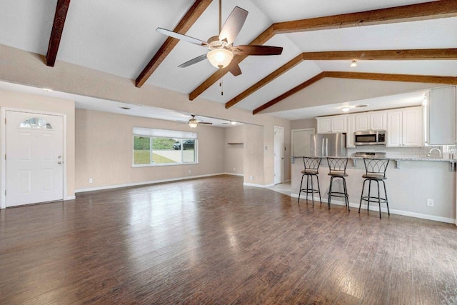 7105 Creighton Ln, Austin, TX 78723 - unfurnished living room featuring a ceiling fan and wood finished floors