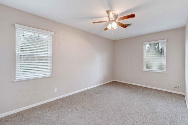 7105 Creighton Ln, Austin, TX 78723 - unfurnished room with carpet flooring, ceiling fan, and baseboards