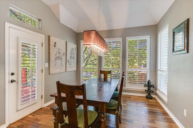 12505 Stapp Ct, Austin, TX 78732 - dining area featuring vaulted ceiling, wood finished floors, and baseboards