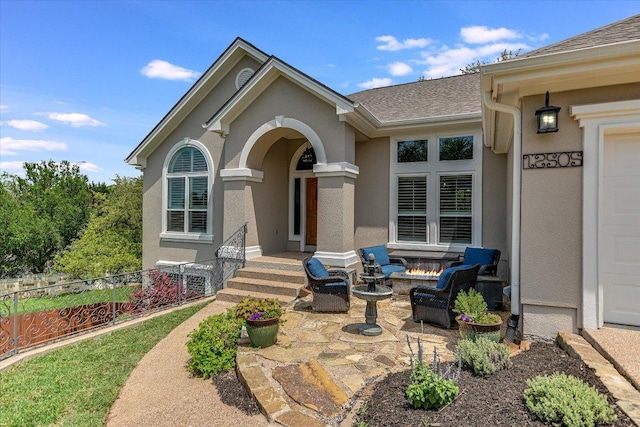 12505 Stapp Ct, Austin, TX 78732 - property entrance featuring a shingled roof, stucco siding, and a patio