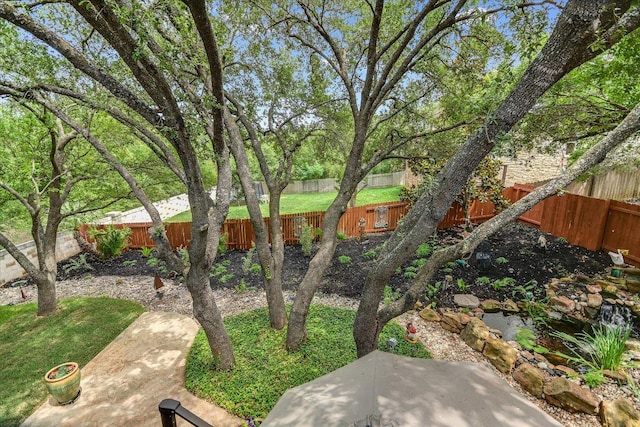 12505 Stapp Ct, Austin, TX 78732 - fenced backyard with a patio